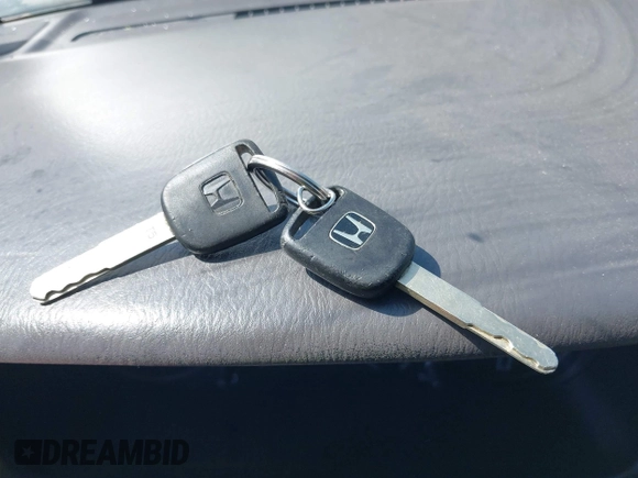 2004 Honda Odyssey EX-L with VIN 5FNRL18934B018040, listed as a IAAI auction lot 42241081 with 250,607 mi miles and . Bid and sale history available at DreamBid. Image 11.