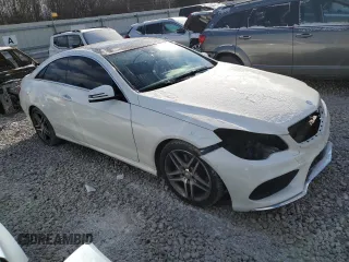 2016 Mercedes-Benz E-Class E 400 with VIN WDDKJ6FB0GF348458, listed as a Copart auction lot 87701385 with 124,867 mi miles and Salvage Title. Bid and sale history available at carsss.com. Image 4.