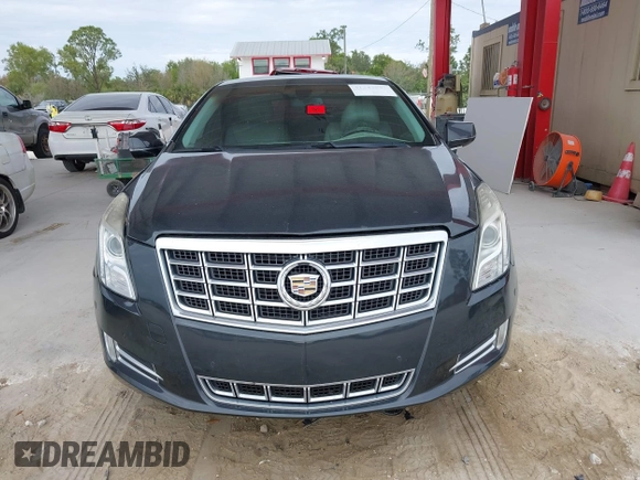 2014 Cadillac XTS Luxury with VIN 2G61M5S33E9217619, listed as a IAAI auction lot 41343003 with 126,303 mi miles. Bid and sale history available at carsss.com. Image 12.