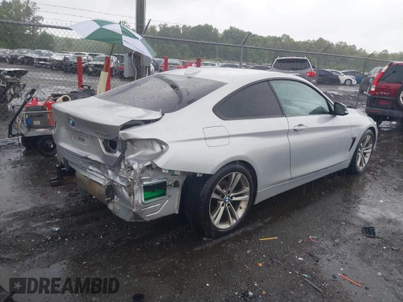 2015 BMW 4 Series 428i with VIN WBA3N3C55FK233180, listed as a IAAI auction lot 42222285 with 190,073 mi miles and . Bid and sale history available at DreamBid. Image 4.