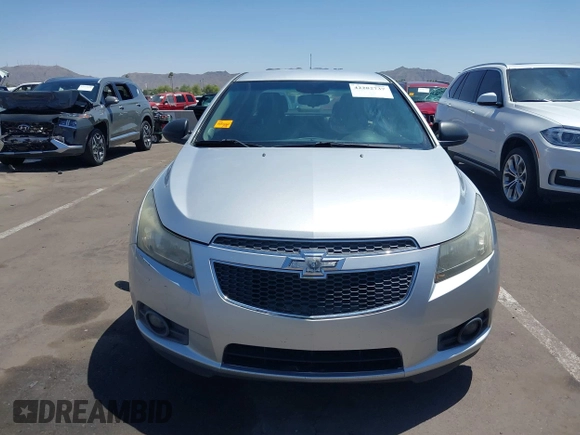 2014 Chevrolet Cruze LS z VIN 1G1PA5SH6E7468916, wystawiony jako IAAI lot #42282737 z przebiegiem 120 129 mil mil oraz . Historia ofert i sprzedaży dostępna na DreamBid. Obrazek 12.