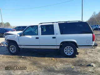 1996 Chevrolet Suburban with VIN 3GNFK16RXTG135350, listed as a IAAI auction lot 41482918 with 157,971 mi miles. Bid and sale history available at carsss.com. Image 14.