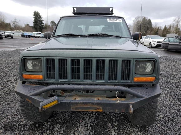 2000 Jeep Cherokee Classic with VIN 1J4FF58S3YL104384, listed as a Copart auction lot 46645415 with 253,730 mi miles and Salvage Title. Bid and sale history available at carsss.com. Image 5.