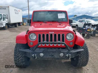 2018 Jeep Wrangler JK Unlimited Sahara with VIN 1C4HJWEG3JL893970, listed as a IAAI auction lot 39530074 with 72,079 mi miles. Bid and sale history available at carsss.com. Image 12.