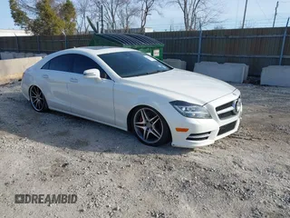 2014 Mercedes-Benz CLS-Class CLS 550 with VIN WDDLJ9BB4EA101031, listed as a IAAI auction lot 41766952 with 104,715 mi miles. Bid and sale history available at carsss.com. Image 1.