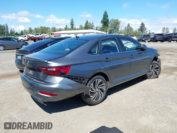 2021 Volkswagen Jetta SEL with VIN 3VWE57BU9MM098736, listed as a IAAI auction lot 42384031 with 28,070 mi miles and . Bid and sale history available at DreamBid. Image 4.