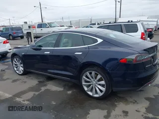 2014 Tesla Model S 60 with VIN 5YJSA1H10EFP30234, listed as a IAAI auction lot 42182249 with 186,654 mi miles and . Bid and sale history available at DreamBid. Image 14.