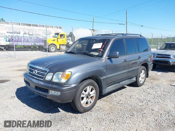 2003 Lexus LX with VIN JTJHT00W233532297, listed as a IAAI auction lot 42189676 with 235,992 mi miles. Bid and sale history available at carsss.com. Image 18.