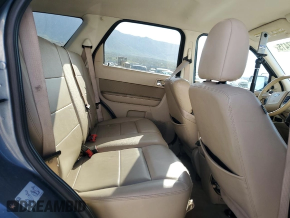 2012 Ford Escape Limited z VIN 1FMCU9EG5CKA16291, wystawiony jako Copart lot #58527415 z przebiegiem 173 637 mil mil oraz Szkoda całkowita • Salvage title. Historia ofert i sprzedaży dostępna na DreamBid. Obrazek 11.
