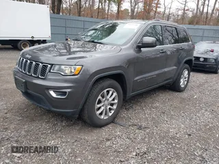 2021 Jeep Grand Cherokee Laredo X with VIN 1C4RJFAG6MC703691, listed as a IAAI auction lot 41655340 with 53,300 mi miles and . Bid and sale history available at DreamBid. Image 17.