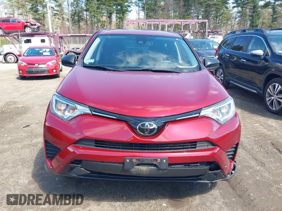 2018 Toyota RAV4 LE with VIN JTMBFREV2JD228186, listed as a IAAI auction lot 42076730 with 93,899 mi miles. Bid and sale history available at carsss.com. Image 17.