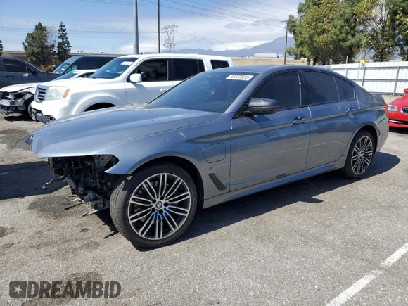 2020 BMW 5 Series 530e with VIN WBAJA9C06LCE66990, listed as a Copart auction lot 48823925 with 57,673 mi miles and Salvage Title. Bid and sale history available at DreamBid. Image 1.