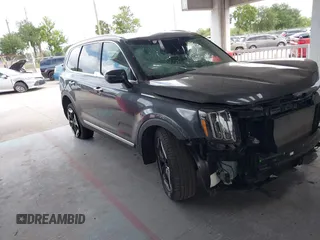 2023 Kia Telluride S with VIN 5XYP6DGC7PG405488, listed as a IAAI auction lot 42135176 with 16,799 mi miles and . Bid and sale history available at carsss.com. Image 1.