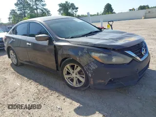 2015 Nissan Altima 2.5 S with VIN 1N4AL3AP3FC430613, listed as a IAAI auction lot 41979818 with 186,921 mi miles. Bid and sale history available at carsss.com. Image 1.