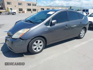 2007 Toyota Prius z VIN JTDKB20U273215633, wystawiony jako IAAI lot #41955538 z przebiegiem 172 957 mil mil oraz . Historia ofert i sprzedaży dostępna na DreamBid. Obrazek 18.