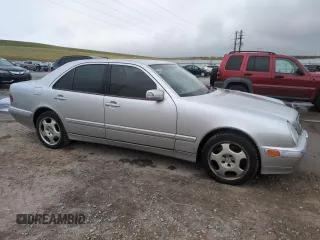 2002 Mercedes-Benz E-Class AWD with VIN WDBJF83J62X072710, listed as a Copart auction lot 54703715 with 114,435 mi miles and Clean Title. Bid and sale history available at carsss.com. Image 5.