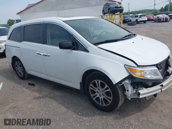 2012 Honda Odyssey EX-L with VIN 5FNRL5H62CB059481, listed as a IAAI auction lot 42241415 with 135,244 mi miles and . Bid and sale history available at DreamBid. Image 1.