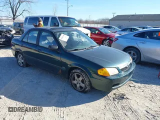 2000 Mazda Protege ES with VIN JM1BJ2211Y0285066, listed as a IAAI auction lot 41581940 with 133,630 mi miles and . Bid and sale history available at DreamBid. Image 1.