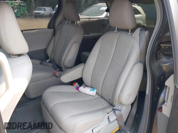 2012 Toyota Sienna XLE with VIN 5TDDK3DC6CS032969, listed as a IAAI auction lot 42423883 with 122,676 mi miles and . Bid and sale history available at DreamBid. Image 8.