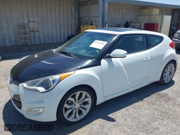 2014 Hyundai Veloster RE:FLEX with VIN KMHTC6AD7EU214911, listed as a IAAI auction lot 42617066 with 115,521 mi miles and . Bid and sale history available at DreamBid. Image 2.