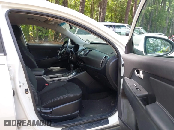 2014 Kia Sportage EX with VIN KNDPCCAC5E7658993, listed as a IAAI auction lot 42679549 with 107,658 mi miles and . Bid and sale history available at DreamBid. Image 5.