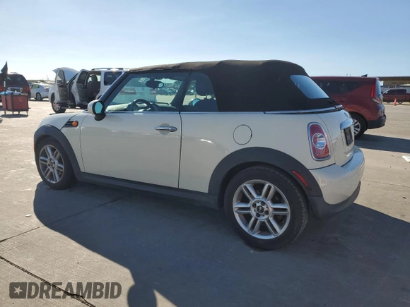 2014 MINI Convertible z VIN WMWZN3C5XET569992, wystawiony jako Copart lot #81044304 z przebiegiem 132 967 mil mil oraz Czysty tytuł • Clean title. Historia ofert i sprzedaży dostępna na DreamBid. Obrazek 2.
