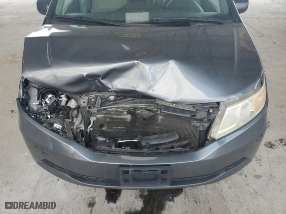 2012 Honda Odyssey LX with VIN 5FNRL5H27CB114813, listed as a Copart auction lot 48942345 with 204,061 mi miles and Salvage Title. Bid and sale history available at carsss.com. Image 12.