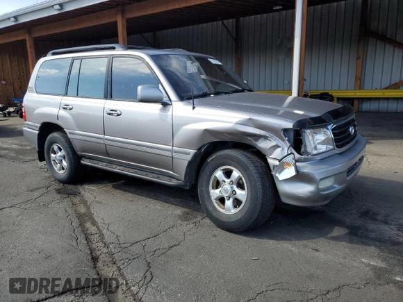 2002 Toyota Land Cruiser z VIN JTEHT05J522027452, wystawiony jako Copart lot #51141595 z przebiegiem 278 465 mil mil oraz Szkoda całkowita • Salvage title. Historia ofert i sprzedaży dostępna na DreamBid. Obrazek 4.