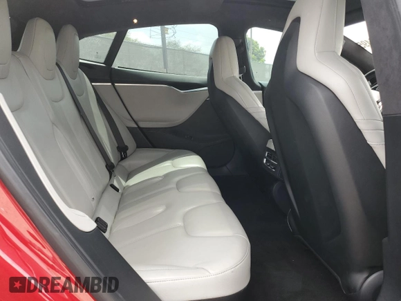 2016 Tesla Model S 90D with VIN 5YJSA1E42GF127593, listed as a Copart auction lot 52450495 with 144,151 mi miles and Salvage title. Bid and sale history available at DreamBid. Image 10.