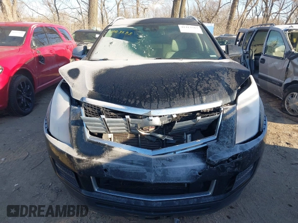 2016 Cadillac SRX Luxury Collection z VIN 3GYFNBE38GS585949, wystawiony jako IAAI lot #41413583 z przebiegiem 98 201 mil mil oraz . Historia ofert i sprzedaży dostępna na DreamBid. Obrazek 12.