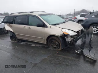 2009 Toyota Sienna CE with VIN 5TDZK23C99S253511, listed as a IAAI auction lot 41556433 with 239,778 mi miles. Bid and sale history available at carsss.com. Image 1.