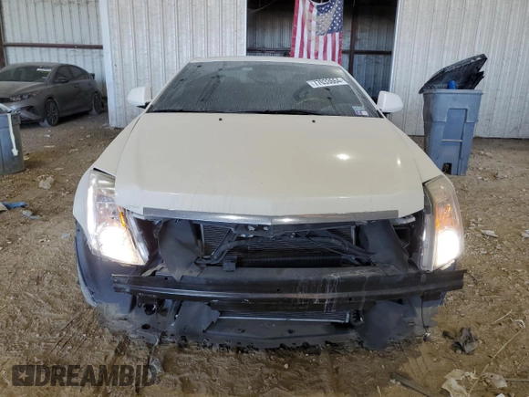 2014 Cadillac CTS Premium with VIN 1G6DD1E38E0178165, listed as a Copart auction lot 77033664 with 49,406 mi miles and Salvage title. Bid and sale history available at DreamBid. Image 5.