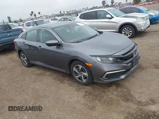 2020 Honda Civic LX with VIN 2HGFC2F63LH567698, listed as a IAAI auction lot 42354886 with 70,977 mi miles and . Bid and sale history available at DreamBid. Image 1.