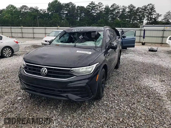 2023 Volkswagen Tiguan SE R-Line Black z VIN 3VVCB7AX5PM030017, wystawiony jako Copart lot #57315575 z przebiegiem 39 577 mil mil oraz Szkoda całkowita • Salvage title. Historia ofert i sprzedaży dostępna na DreamBid. Obrazek 14.