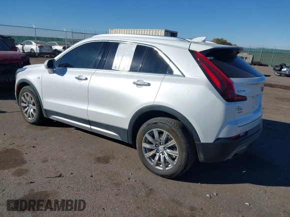 2020 Cadillac XT4 AWD Premium Luxury z VIN 1GYFZDR46LF083118, wystawiony jako IAAI lot #40495567 z przebiegiem 83 224 mil mil oraz . Historia ofert i sprzedaży dostępna na DreamBid. Obrazek 3.