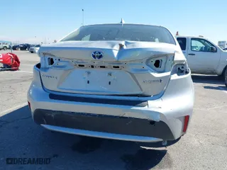 2020 Toyota Corolla Hybrid LE with VIN JTDEBRBE0LJ027338, listed as a IAAI auction lot 41721044 with 120,868 mi miles. Bid and sale history available at carsss.com. Image 6.