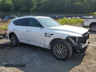 2021 Genesis GV80 with VIN KMUHBDSB9MU036008, listed as a Copart auction lot 59990915 with 62,294 mi miles and Salvage title. Bid and sale history available at DreamBid. Image 4.