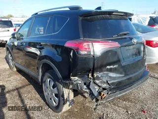 2018 Toyota RAV4 LE with VIN 2T3BFREV8JW706999, listed as a IAAI auction lot 41863485 with 115,589 mi miles. Bid and sale history available at carsss.com. Image 3.