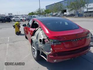 2016 Tesla Model S 70 with VIN 5YJSA1E17GF152401, listed as a IAAI auction lot 42272384 with 65,698 mi miles and . Bid and sale history available at DreamBid. Image 20.
