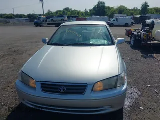 2000 Toyota Camry CE z VIN JT2BG22K6Y0433633, wystawiony jako IAAI lot #42409568 z przebiegiem 119 672 mil mil oraz . Historia ofert i sprzedaży dostępna na DreamBid. Obrazek 6.