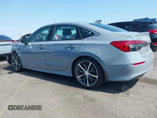 2023 Honda Civic Touring with VIN 2HGFE1F92PH322377, listed as a IAAI auction lot 42361473 with 43,533 mi miles and . Bid and sale history available at DreamBid. Image 13.