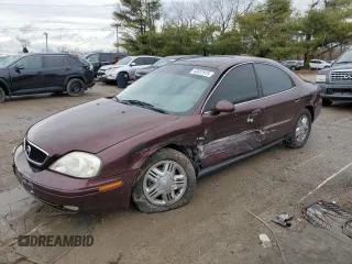 2000 Mercury Sable LS Premium with VIN 1MEFM55S0YA606201, listed as a Copart auction lot 43451915 with 101,294 mi miles and Salvage Title. Bid and sale history available at carsss.com. Image 1.
