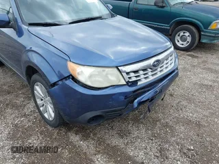 2011 Subaru Forester X Premium z VIN JF2SHACC3BH720685, wystawiony jako IAAI lot #42316944 z przebiegiem 209 901 mil mil oraz . Historia ofert i sprzedaży dostępna na DreamBid. Obrazek 6.