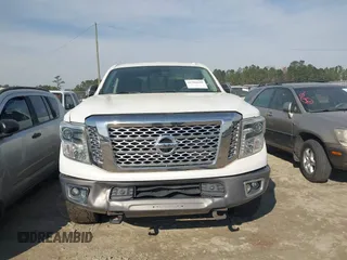 2016 Nissan Titan Platinum Reserve z VIN 1N6BA1F22GN509568, wystawiony jako IAAI lot #41766629 z przebiegiem 94 991 mil mil oraz . Historia ofert i sprzedaży dostępna na DreamBid. Obrazek 12.