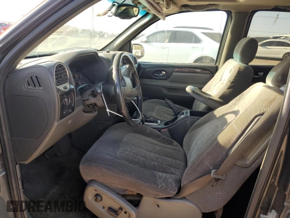 2004 GMC Envoy SLE with VIN 1GKDT13S042404250, listed as a Copart auction lot 52672455 with 230,610 mi miles and Salvage Title. Bid and sale history available at carsss.com. Image 7.