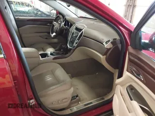 2012 Cadillac SRX Performance Collection with VIN 3GYFNEE36CS657582, listed as a IAAI auction lot 42084319 with 171,335 mi miles. Bid and sale history available at carsss.com. Image 5.