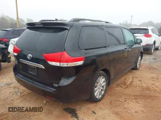 2012 Toyota Sienna XLE with VIN 5TDDK3DC3CS030466, listed as a IAAI auction lot 41914368 with 174,512 mi miles. Bid and sale history available at carsss.com. Image 4.