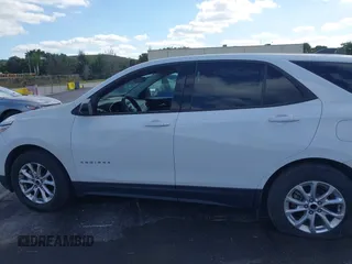 2019 Chevrolet Equinox LS z VIN 2GNAXHEV9K6237980, wystawiony jako IAAI lot #41265515 z przebiegiem 84 437 mil mil oraz . Historia ofert i sprzedaży dostępna na DreamBid. Obrazek 14.