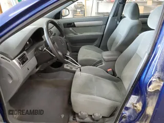 2005 Suzuki Forenza S z VIN KL5JD56Z85K231581, wystawiony jako Copart lot #78122504 z przebiegiem 138 746 mil mil oraz Szkody całkowita. Historia ofert i sprzedaży dostępna na DreamBid. Obrazek 7.
