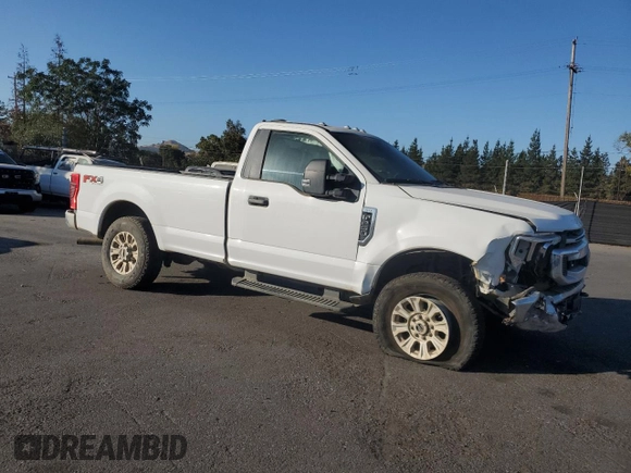 2022 Ford F-250 XL with VIN 1FTBF2B69NEE39910, listed as a Copart auction lot 73411214 with 16,123 mi miles and Salvage title. Bid and sale history available at DreamBid. Image 4.